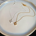 18K Gold Plated Copper Zircon Hollow Square Pendant Necklace Light Luxury Vintage Collarbone Chain view 2