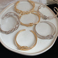 Irregular Twisted Metal Open Bangle Niche Designer Statement Bracelet With Premium Look view 3