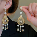 French Vintage Copper Teardrop Pearl Drop Earrings With Rhinestone Hollow Design view 1