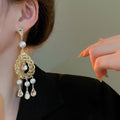 French Vintage Copper Teardrop Pearl Drop Earrings With Rhinestone Hollow Design view 3