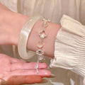 Light Luxury Copper Bangle With White And Pink Crystal Clover Leaf Flower Beads view 4