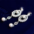 Silver Tone Pearl Oval Halo Crystal Pearl Look Two Designs Metal Dangle Earrings view 3