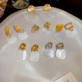 24K Gold Plated Copper Heart Stud Earrings With Zircon Mother Of Pearl And Silver Posts Light Luxury Style view 3