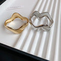 2026 New European Style Alloy Irregular Smooth Wavy Open Bangle Minimalist Statement Jewelry view 4