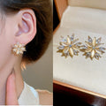 French Light Luxury Copper 3D Flower Zircon Cat Eye Stone Stud Earrings view 1