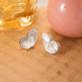 Elegant Vintage Gold Alloy Hollow Butterfly Stud Earrings For Women Chinese Style Lightweight Statement Earrings view 4