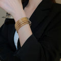 European Style Metal Twisted Spiral Swirl Bangle Minimalist Light Luxury Round Bracelet view 1