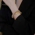European Style Metal Twisted Spiral Swirl Bangle Minimalist Light Luxury Round Bracelet view 3