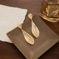 Elegant Gold Alloy Ribbed Teardrop Dangle Earrings With Crystal Studs Luxury Pleated Statement Earrings view 4