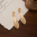 Elegant Gold Alloy Ribbed Teardrop Dangle Earrings With Crystal Studs Luxury Pleated Statement Earrings view 3