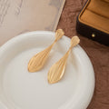Elegant Gold Alloy Ribbed Teardrop Dangle Earrings With Crystal Studs Luxury Pleated Statement Earrings view 2