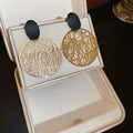Vintage Hollow Metal Round Disc Stud Earrings European American Luxe Geometric Earrings for Women view 4