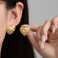 Elegant Korean Gold Alloy Heart Bow Stud Earrings For Women, Textured Luxury Niche Fashion Earrings view 1