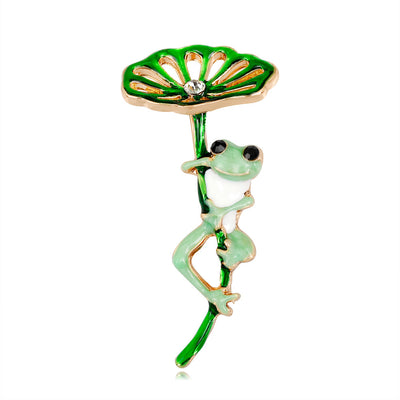 Front product view of the frog brooch pin in green and gold