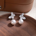 Elegant Butterfly Pearl Drop Studs With Silver Needle And Rhinestone Accents Women Fashion Earrings view 2