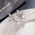Elegant Butterfly Pearl Drop Studs With Silver Needle And Rhinestone Accents Women Fashion Earrings view 3