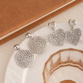 Elegant Silver Alloy Hollow Heart Pendant Drop Earrings Vintage Luxury Openwork Dangle Earrings view 2