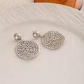 Elegant Silver Alloy Hollow Heart Pendant Drop Earrings Vintage Luxury Openwork Dangle Earrings view 3