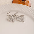 Elegant Silver Alloy Hollow Heart Pendant Drop Earrings Vintage Luxury Openwork Dangle Earrings view 4