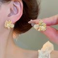 French Light Luxury Alloy Cat Eye Stone Flower Stud Earrings For Women Geometric Designer Jewelry view 1