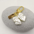 Metal Rose Bow Pearl Tassel Keychain Car Mirror Charm view 4