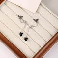 Vintage Silver Alloy Butterfly Stud Chain Drop Black Heart Pendant Asymmetric Women's Fashion Earrings view 2