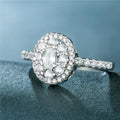 Silver Oval Pavé Cluster Ring In A Polished Decorative Design view 3