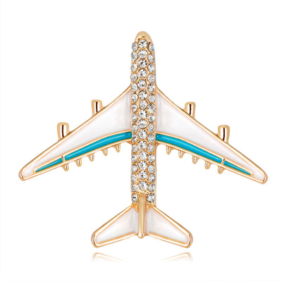 Front product view of the flower brooch pin in gold and aqua
