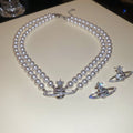 2026 French Light Luxury Faux Pearl Zircon Saturn Star Pendant Clavicle Necklace view 2