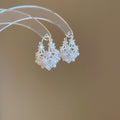 Chic Faux Pearl Hollow Flower Basket U Shaped Earrings, Light Luxury Floral Ear Cuffs view 2