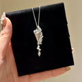 Light Luxury Copper Hourglass Pendant Necklace For Women With Starry Geometric Round Design view 1
