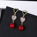 Gold Double Heart Sequin Pearl Look Dangle Earrings view 4
