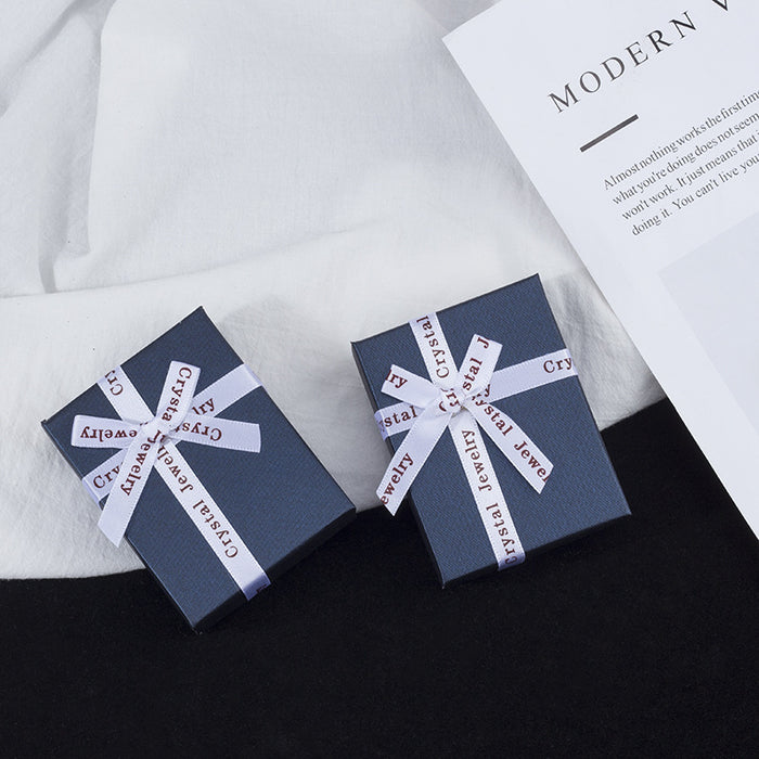 Navy Jewelry Presentation Box With White Ribbon Bow
