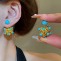 Light Luxury Resin Hollow Flower Double Sided Stud Earrings With Silver Needles view 1