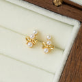 Elegant Mini Bowknot Pearl Alloy Stud Earrings For Women Light Luxury Commuter Fashion Daily Earrings view 2