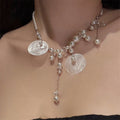 Korean Style Faux Pearl Shell Tassel Pendant Necklace With Round Geometric Charm For Women view 4