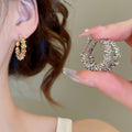 Irregular Crushed Silver Alloy Hoop Earrings Minimalist Light Luxury Round Design view 1