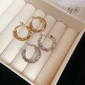 Irregular Crushed Silver Alloy Hoop Earrings Minimalist Light Luxury Round Design view 4