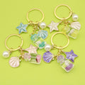 Metal Ocean-Themed Seashell Mermaid Pearl Wish Bottle Glow Keychain Gift view 1