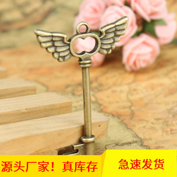 Double Sided Angel Wing Key Charms in Three Metal Finishes