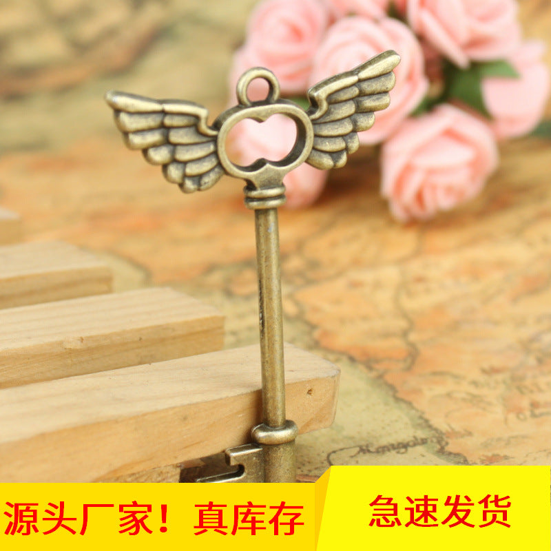 Vintage Alloy Angel Wing Key Charm Pendant