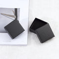 Compact Black Square Jewelry Box With Subtle Woven Texture view 4