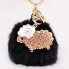 Champagne-Sheep Black-Pom