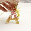 Metal Beige Letter Keychain With White Tassel Bag Charm view 4