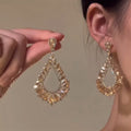 Rhinestone Hollow Teardrop Alloy Stud Earrings For Women Light Luxury Geometric Jewelry view 1
