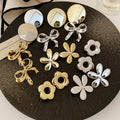 Glossy Metal Flower Bow Stud Earrings With Steel Posts European American Light Luxury Jewelry view 1