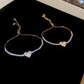 Light Luxury Copper Bangle With Sparkling Zircon Heart Pendant For Women view 4