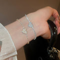 Light Luxury Copper Bangle With Sparkling Zircon Heart Pendant For Women view 1