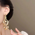 Light Luxury Alloy Rhinestone Hollow Geometric Teardrop Tassel Drop Earrings For Women view 3