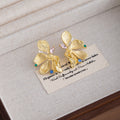 Elegant French Gold Alloy Zircon Floral Stud Earrings Luxury Textured Flower Statement Earrings view 4